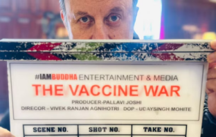Anupam Kher joins the cast of Vivek Agnihotri’s upcomig film ‘The Vaccine War’ Anupam Kher with clapboard of The Vaccine War