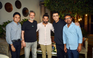Karan Johar, Anil Thadani, JR NTR with the makers of Devara film